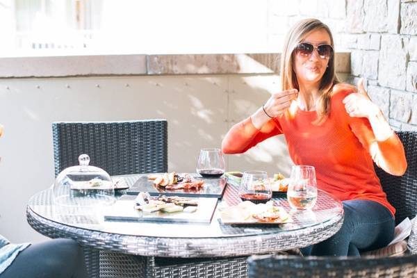 Woman sitting at a table.