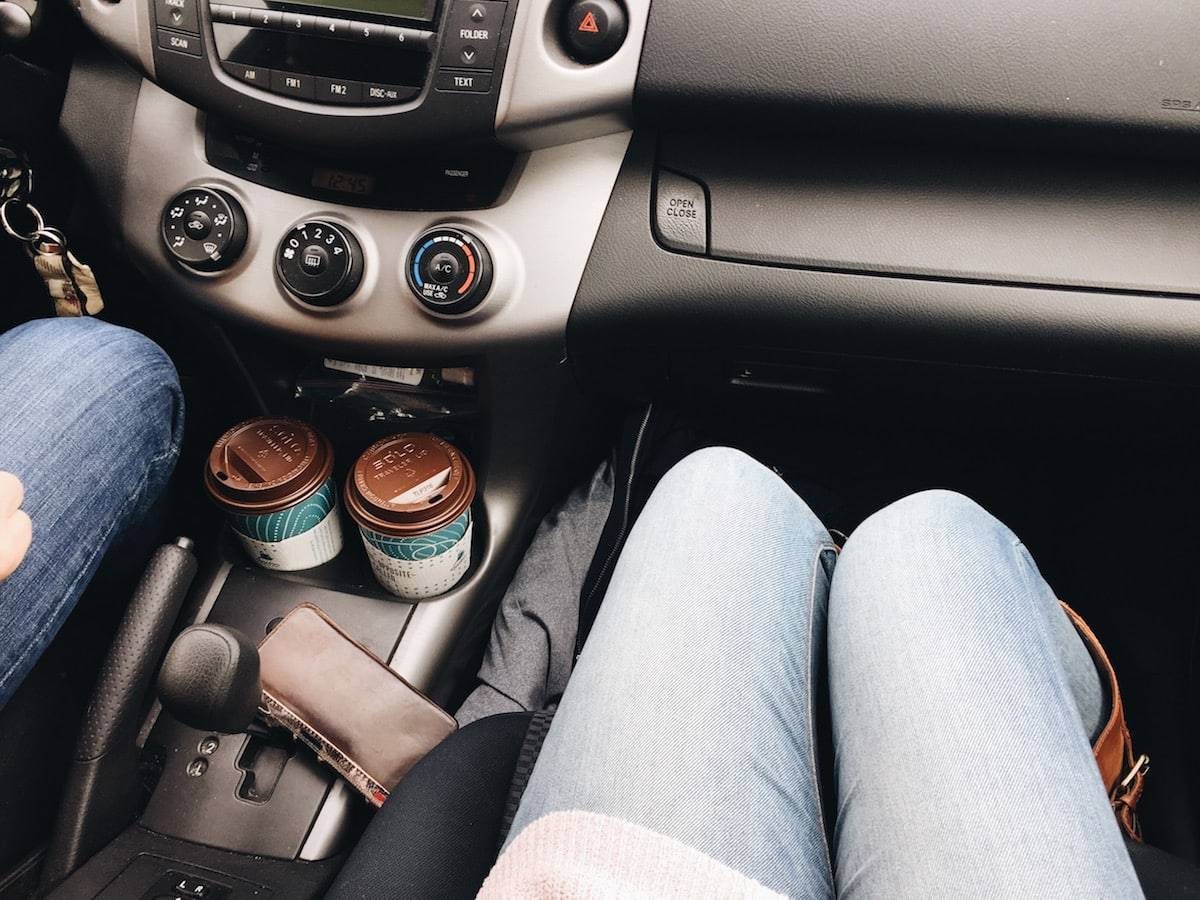 Legs in a vehicle.
