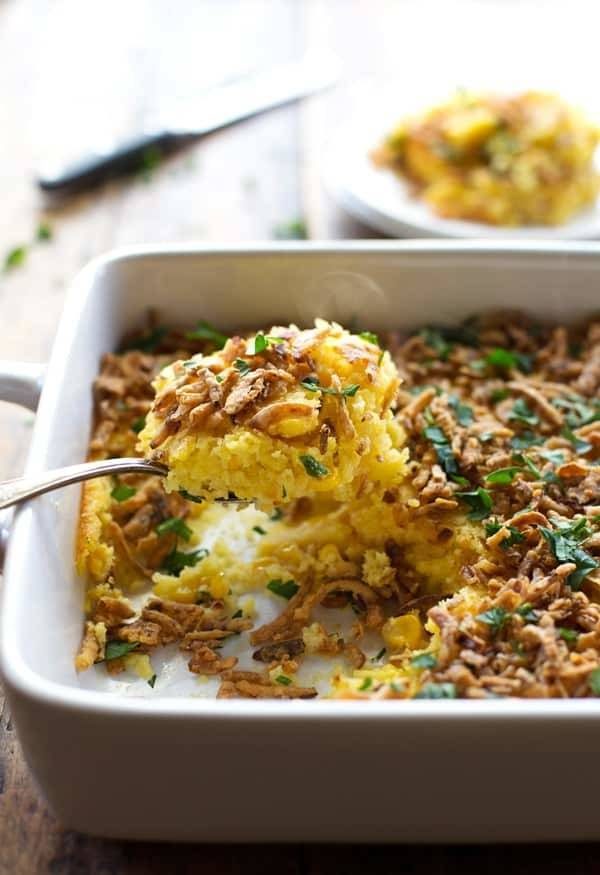 Food in a white baking dish.