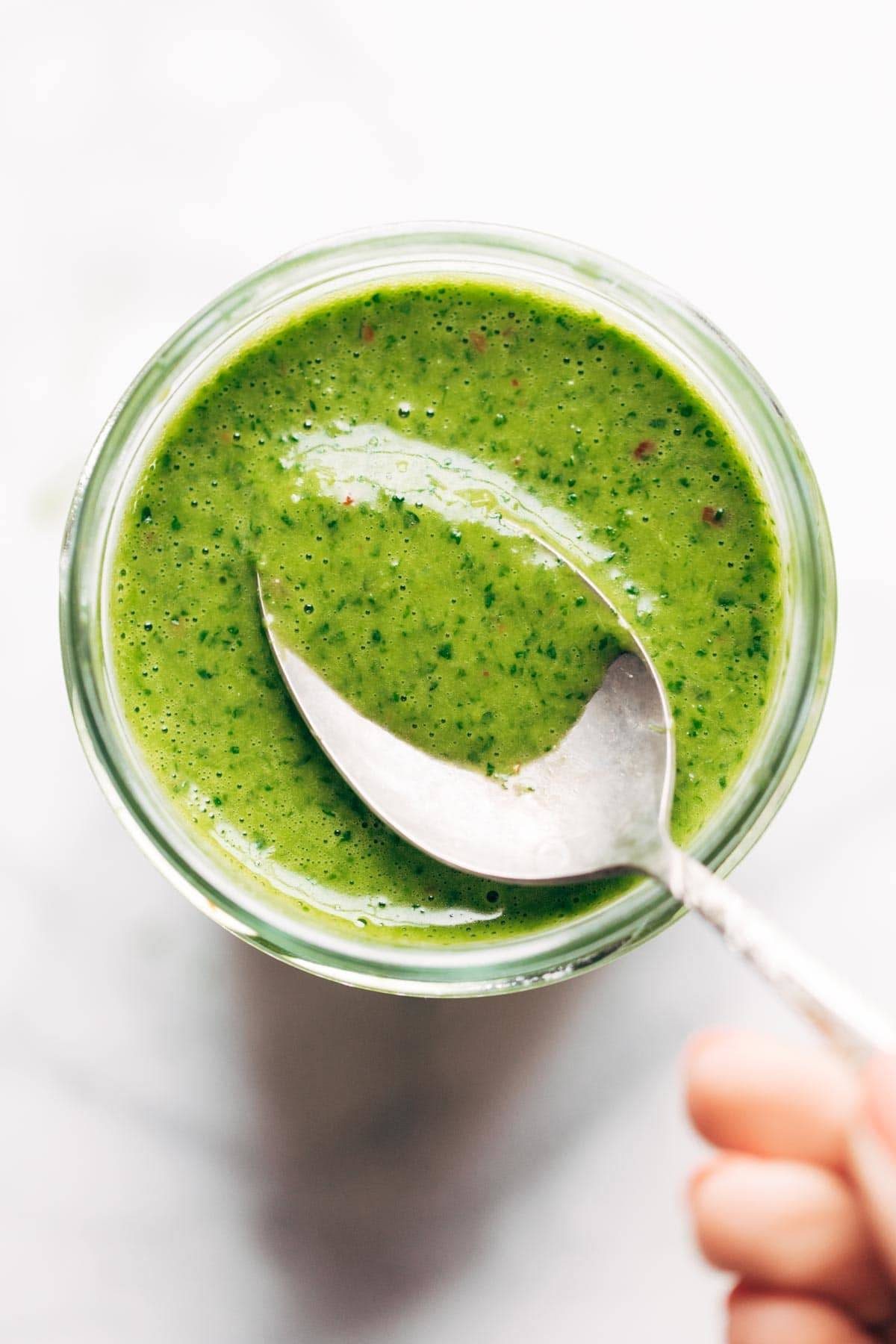 Cilantro vinaigrette in a jar.