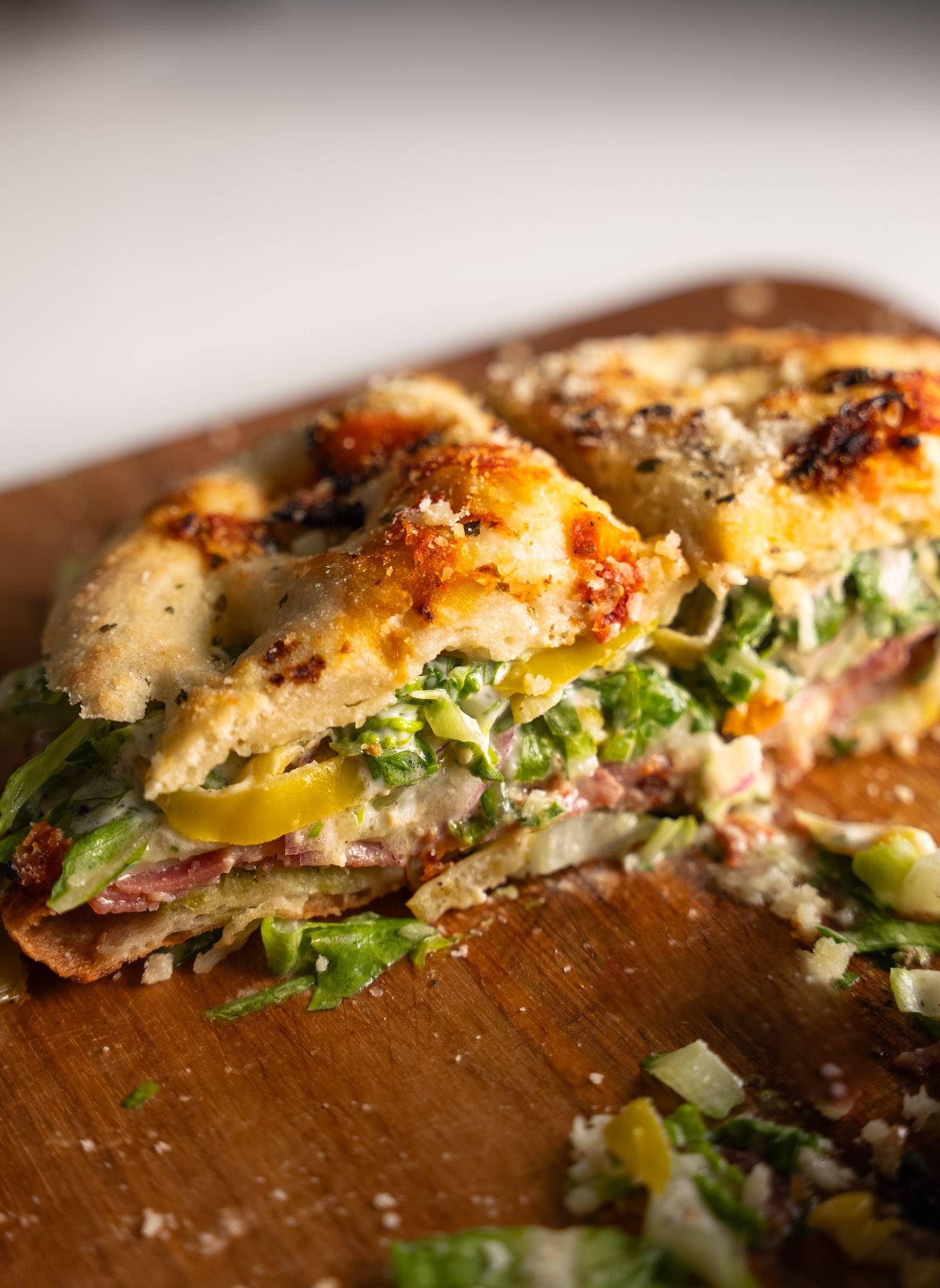 Grinder sandwich on a cutting board.