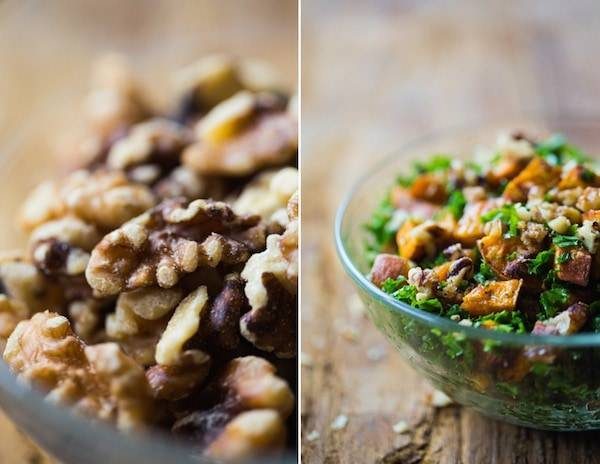 This Roasted Sweet Potato Salad has a handful of shredded kale, candied walnuts, and the best creamy almond dressing. Yum! | pinchofyum.com